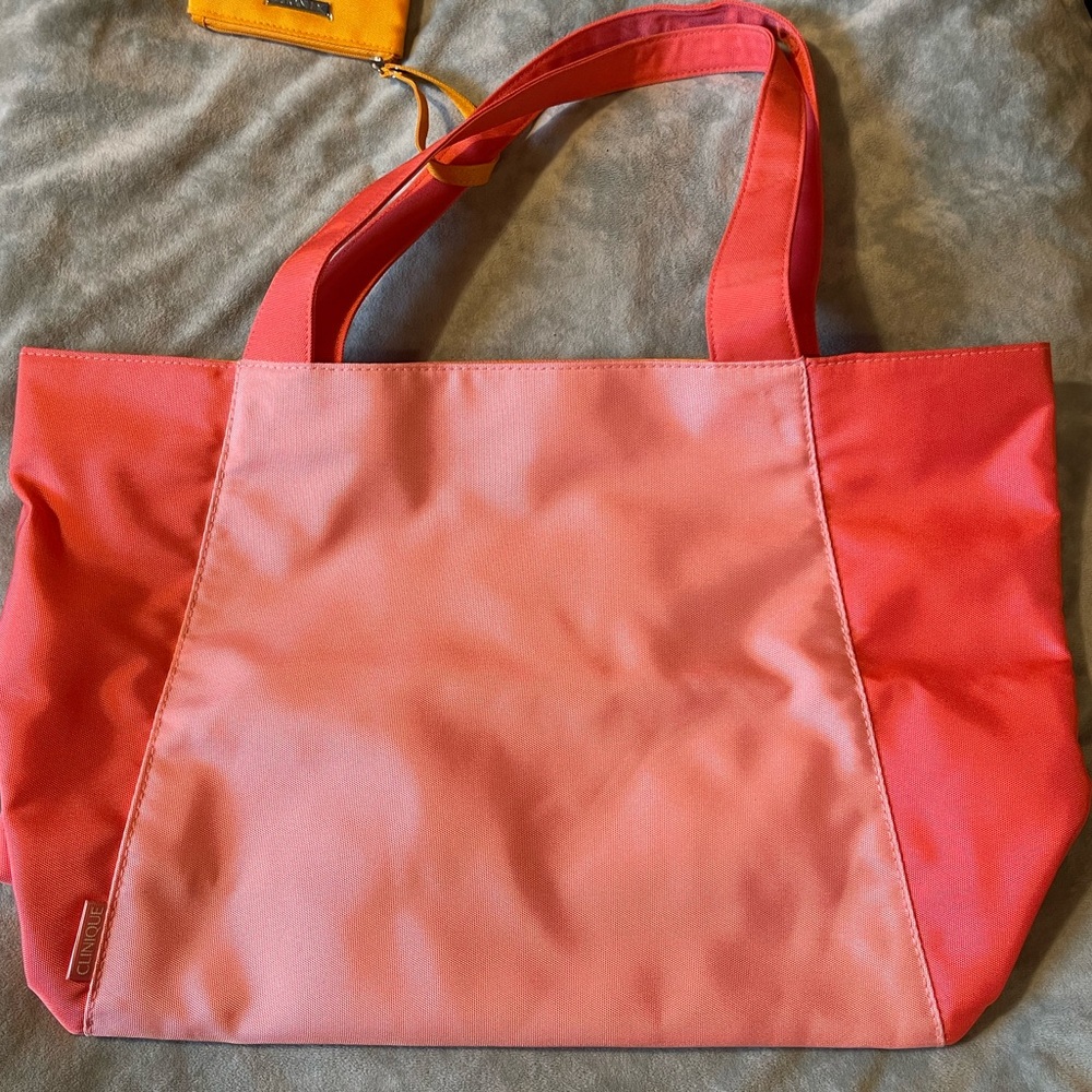 Stylish Clinique Coral Tote Bag with attached Mini Bag